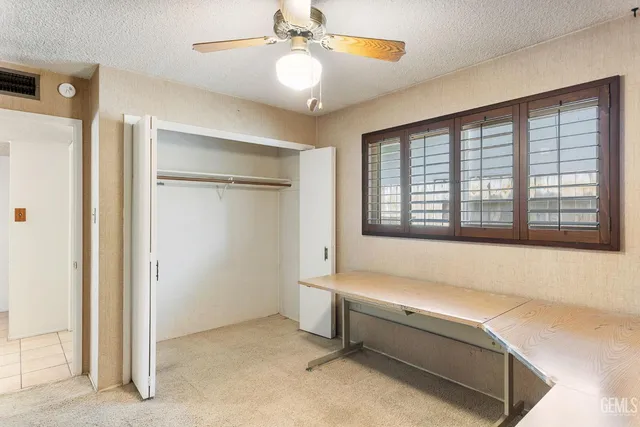 a bath room with a sink and a mirror