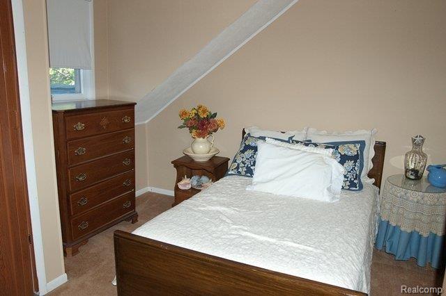 25891 Inkster Road Flat Rock, MI 48134 - Photo 18 of 24 Upper level BR w/neutral decor!