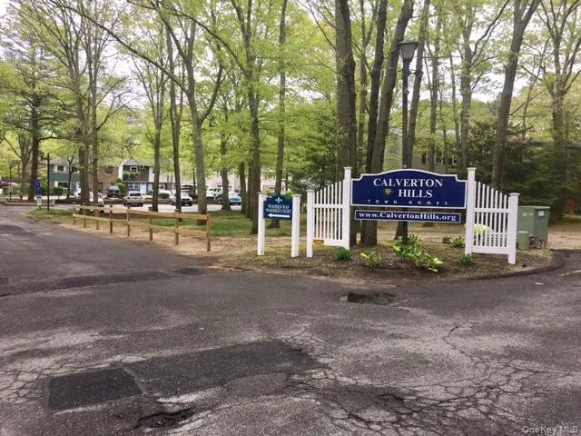 a sign board with parking space