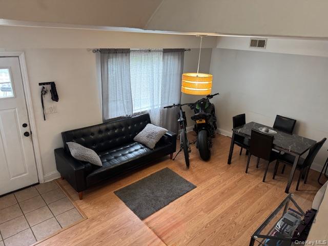 227 Hill Rise Calverton, NY 11933 - Photo 3 of 21 a living room with furniture and a window