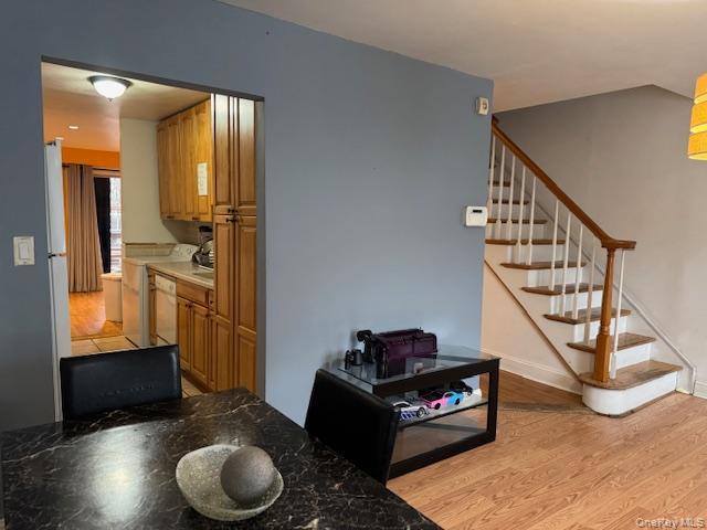 227 Hill Rise Calverton, NY 11933 - Photo 5 of 21 a living room with furniture and a wooden floor