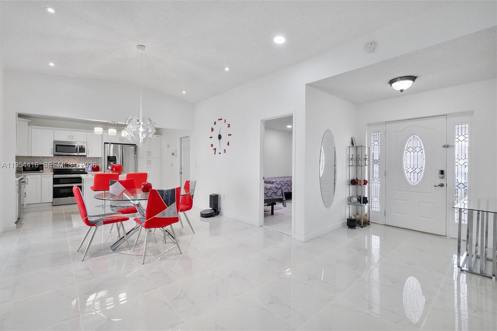 26161 Southwest 130th Avenue Homestead, FL 33032 - Photo 3 of 51 a living room with furniture and white walls