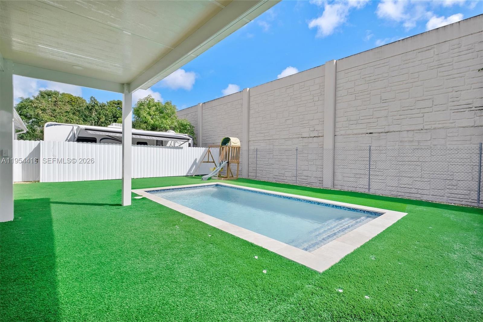 26161 Southwest 130th Avenue Homestead, FL 33032 - Photo 40 of 51 Patio Artificial Grass