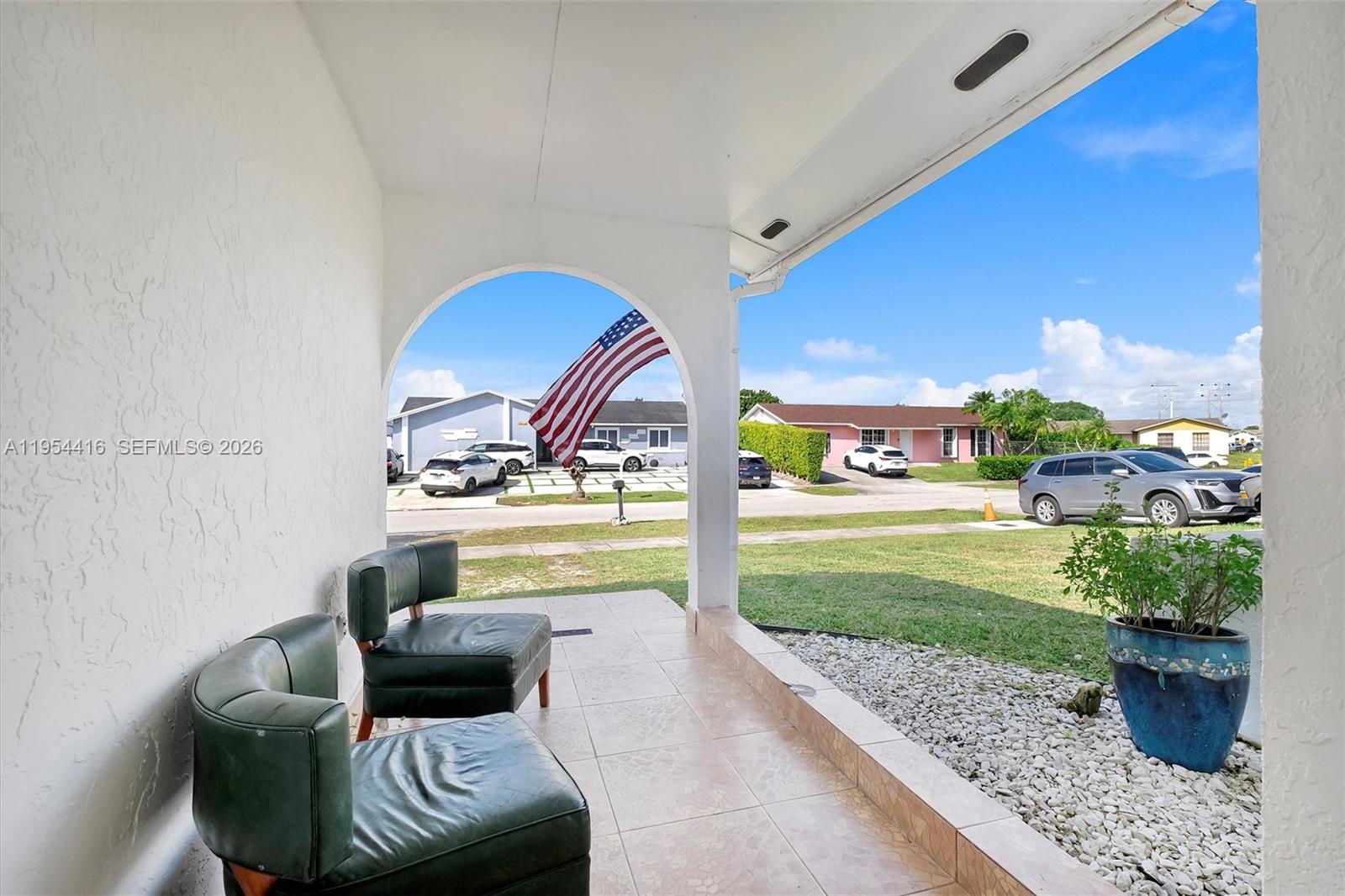 26161 Southwest 130th Avenue Homestead, FL 33032 - Photo 5 of 51 a view of swimming pool with outdoor seating