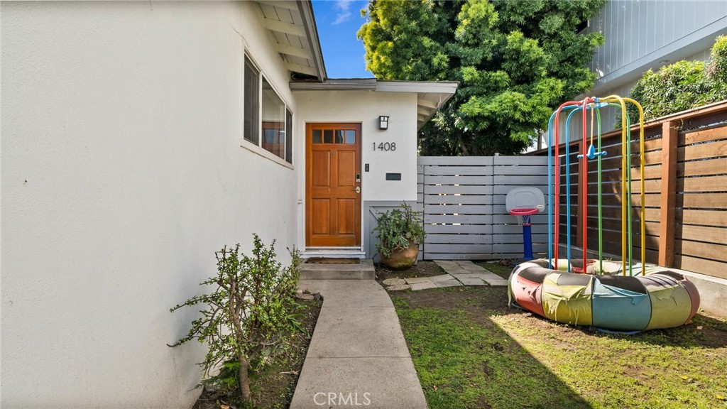 1406 17th Street Manhattan Beach, CA 90266 - Photo 2 of 60 a view of a backyard with couches and plants