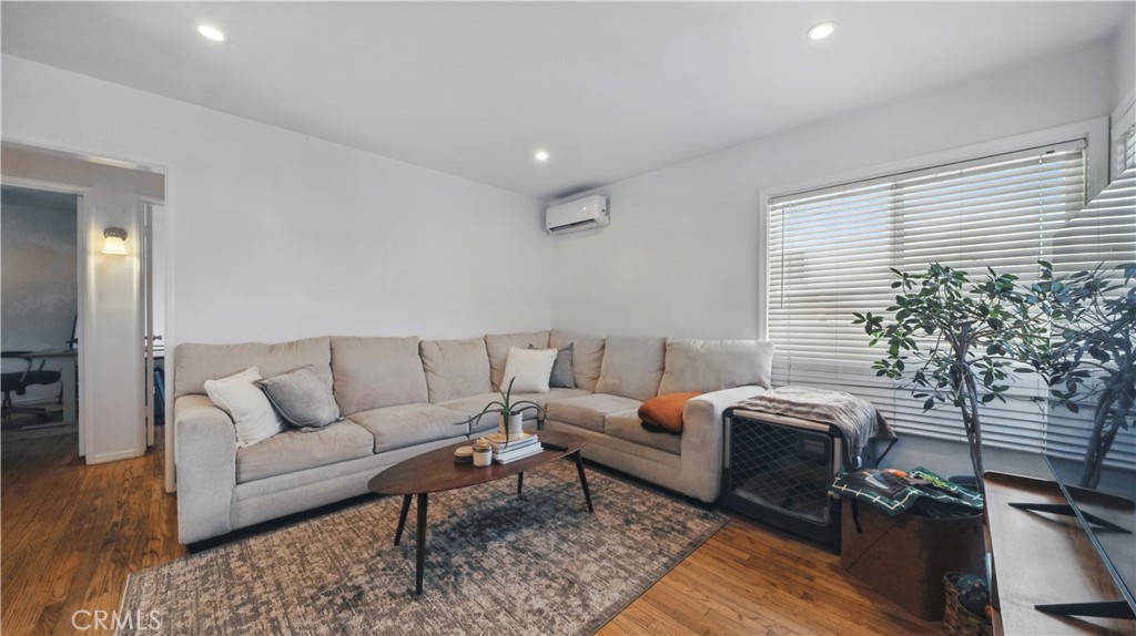 1406 17th Street Manhattan Beach, CA 90266 - Photo 32 of 60 a living room with furniture and a couch