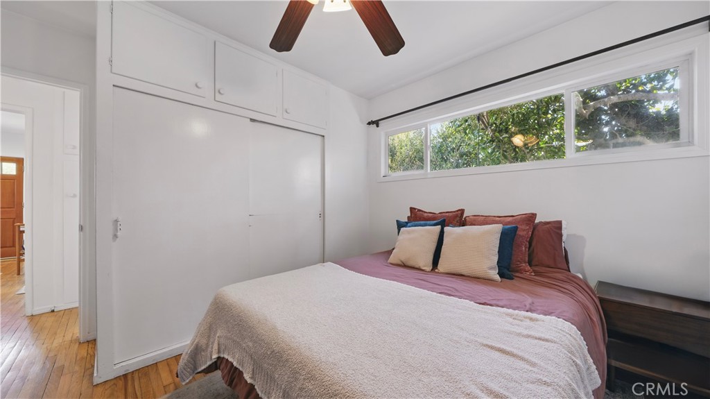 1406 17th Street Manhattan Beach, CA 90266 - Photo 36 of 60 a bedroom with a bed and a window