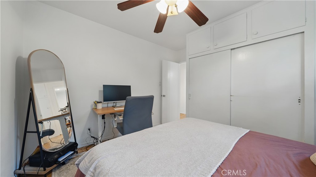 1406 17th Street Manhattan Beach, CA 90266 - Photo 37 of 60 a bedroom with a bed and furniture