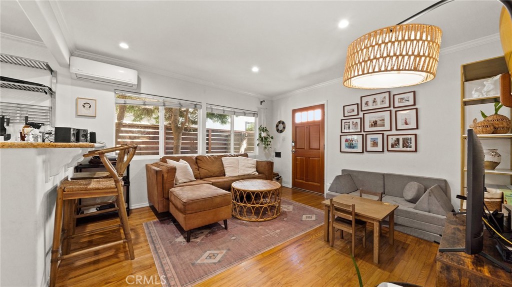 1406 17th Street Manhattan Beach, CA 90266 - Photo 8 of 60 a living room with furniture and a large window