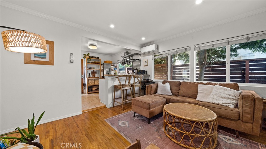 1406 17th Street Manhattan Beach, CA 90266 - Photo 10 of 60 a living room with furniture and a large window