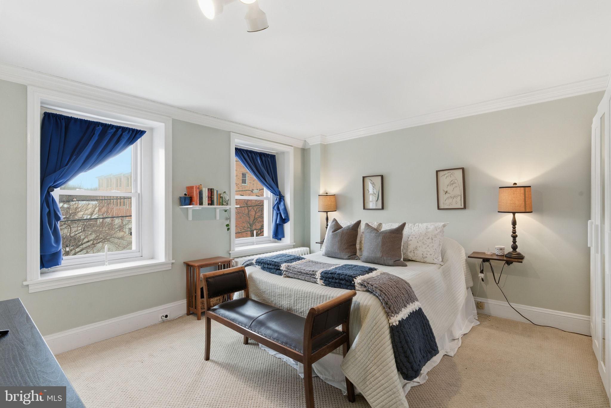 405 Leverington Avenue Philadelphia, PA 19128 - Photo 13 of 25 a bedroom with a bed and a window