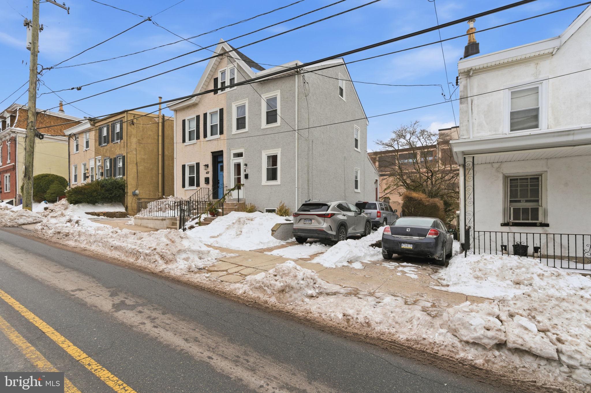405 Leverington Avenue Philadelphia, PA 19128 - Photo 2 of 25 a view of a car park in front of house