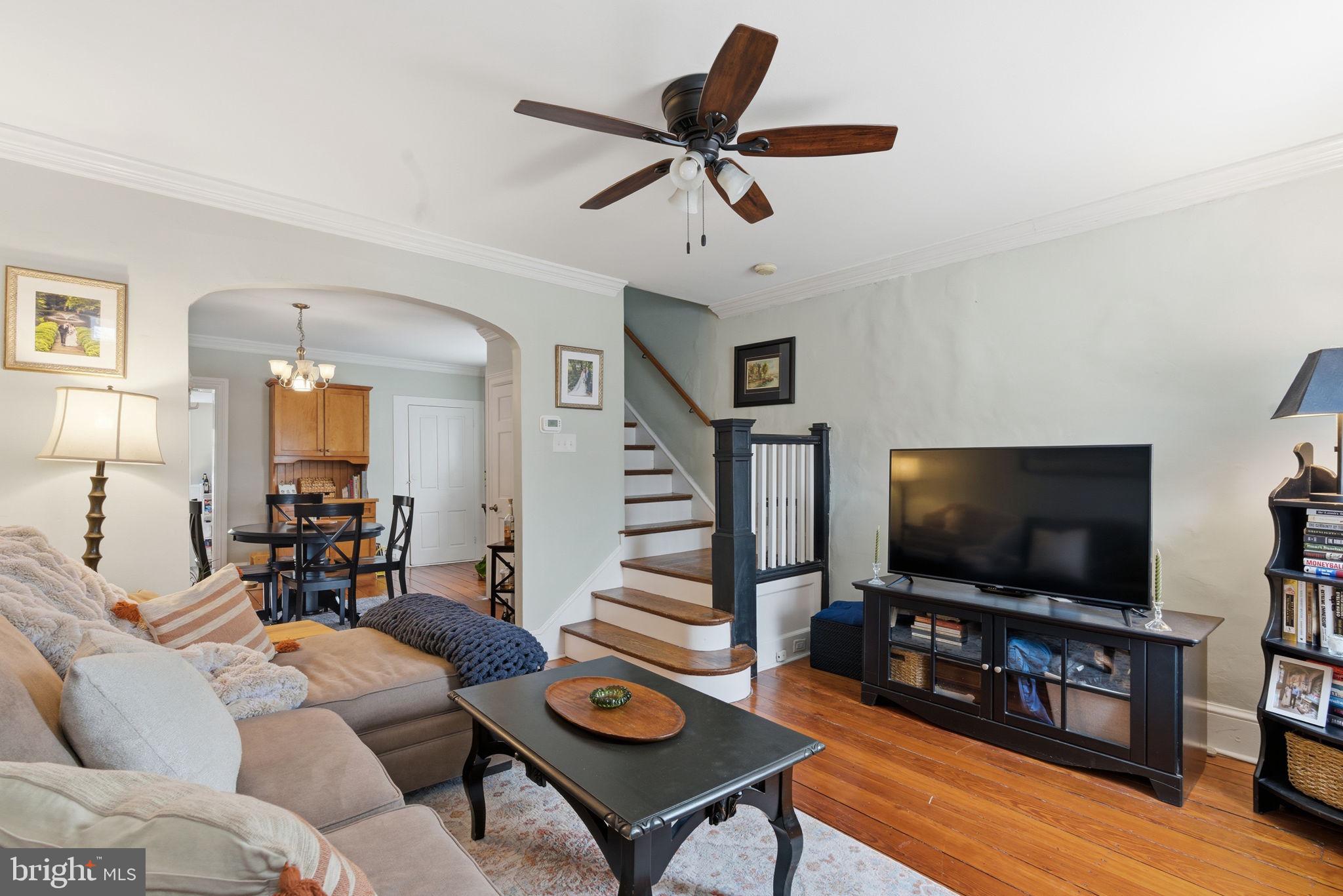 405 Leverington Avenue Philadelphia, PA 19128 - Photo 4 of 25 a living room with furniture and a flat screen tv