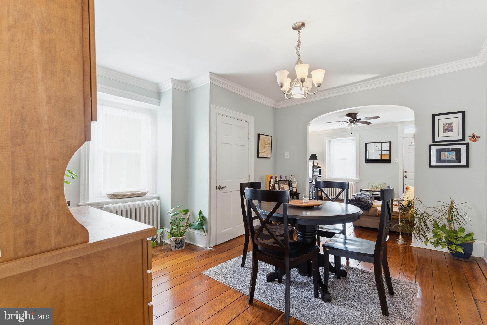 405 Leverington Avenue Philadelphia, PA 19128 - Photo 7 of 25 a view of a dining room with furniture and wooden floor