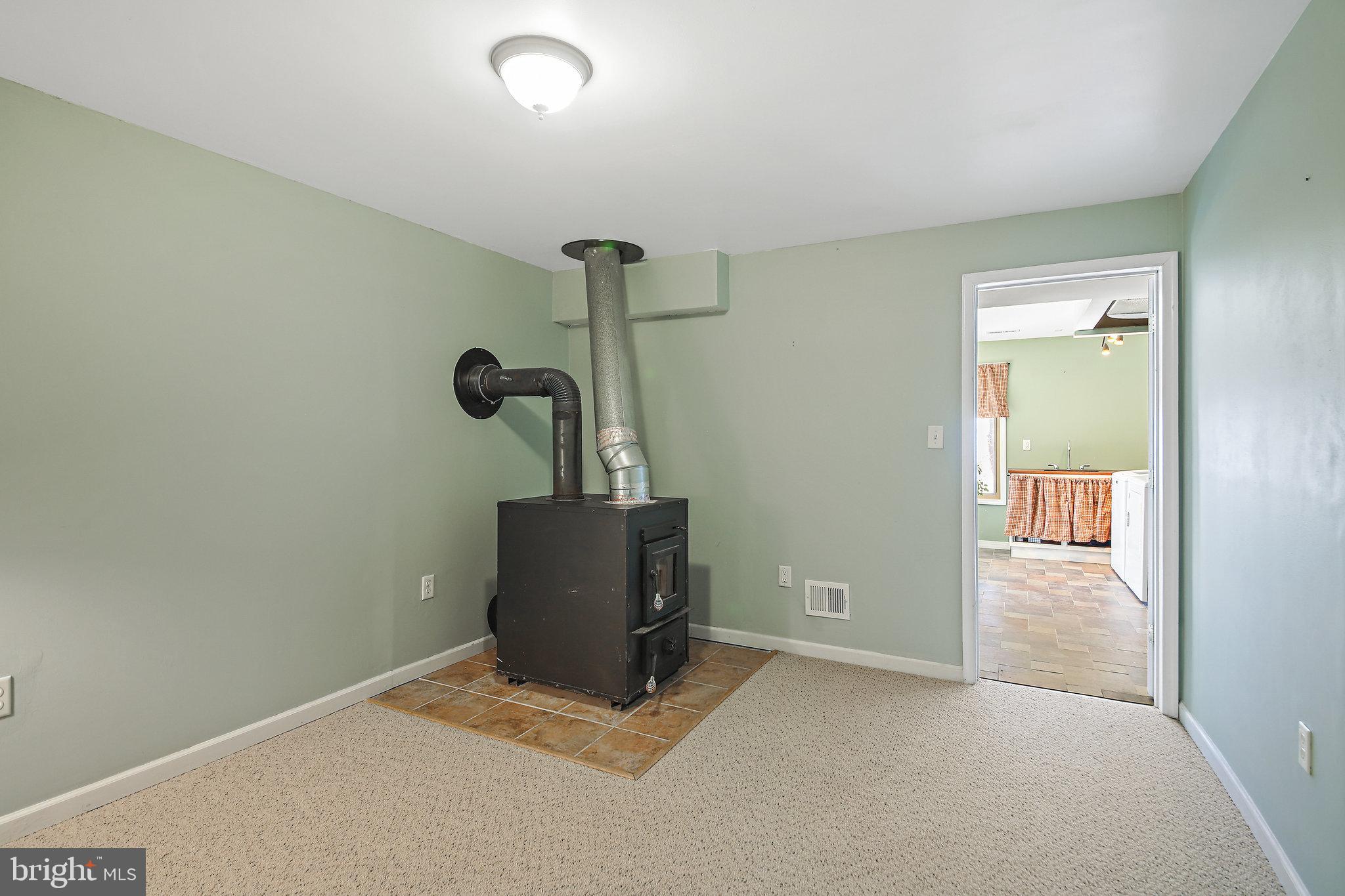 180 Marsden Heights Road Linden, VA 22642 - Photo 34 of 77 England wood stove heats the whole home