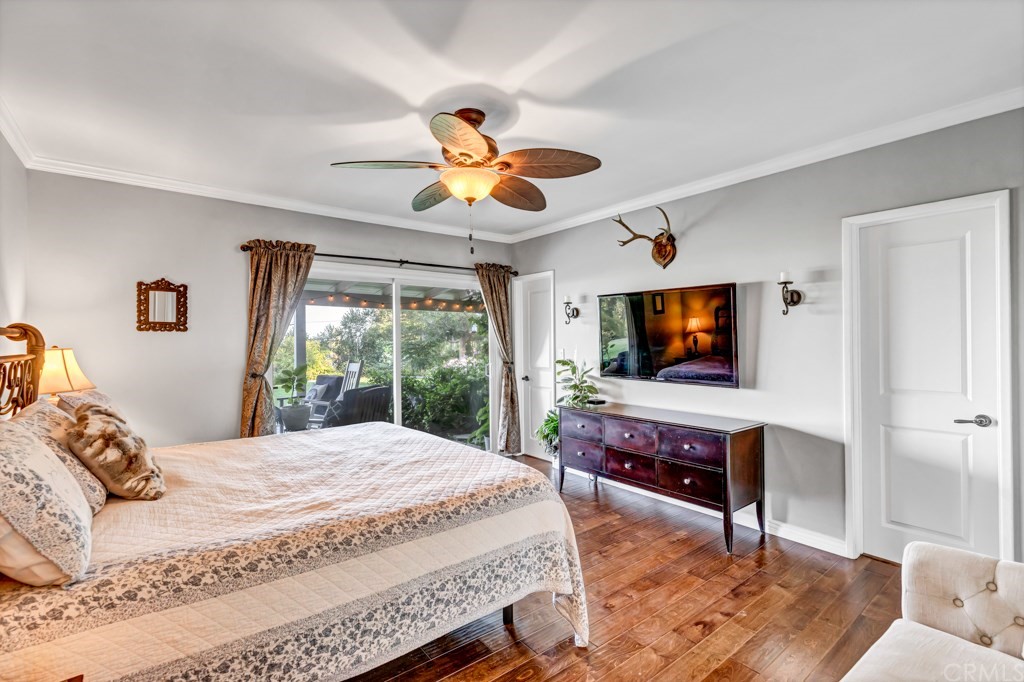 2601 Sunnyside Ridge Road Rancho Palos Verdes, CA 90275 - Photo 20 of 47 a bedroom with a bed and a flat screen tv