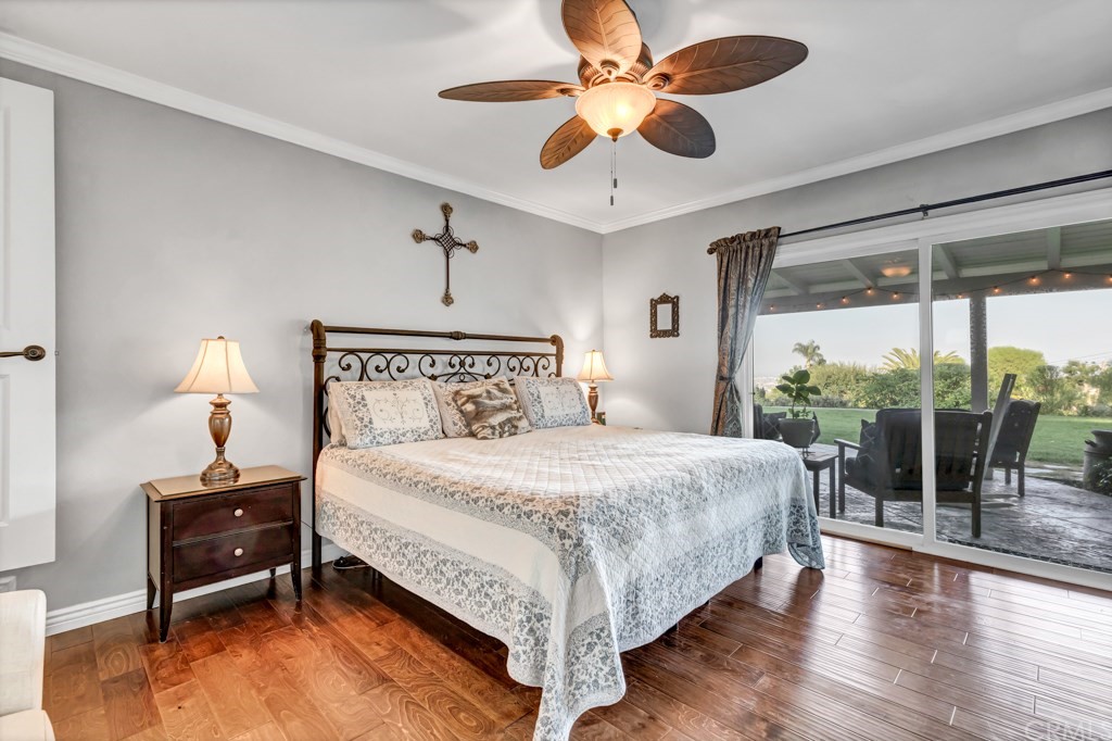 2601 Sunnyside Ridge Road Rancho Palos Verdes, CA 90275 - Photo 21 of 47 a bedroom with a large bed and a large window