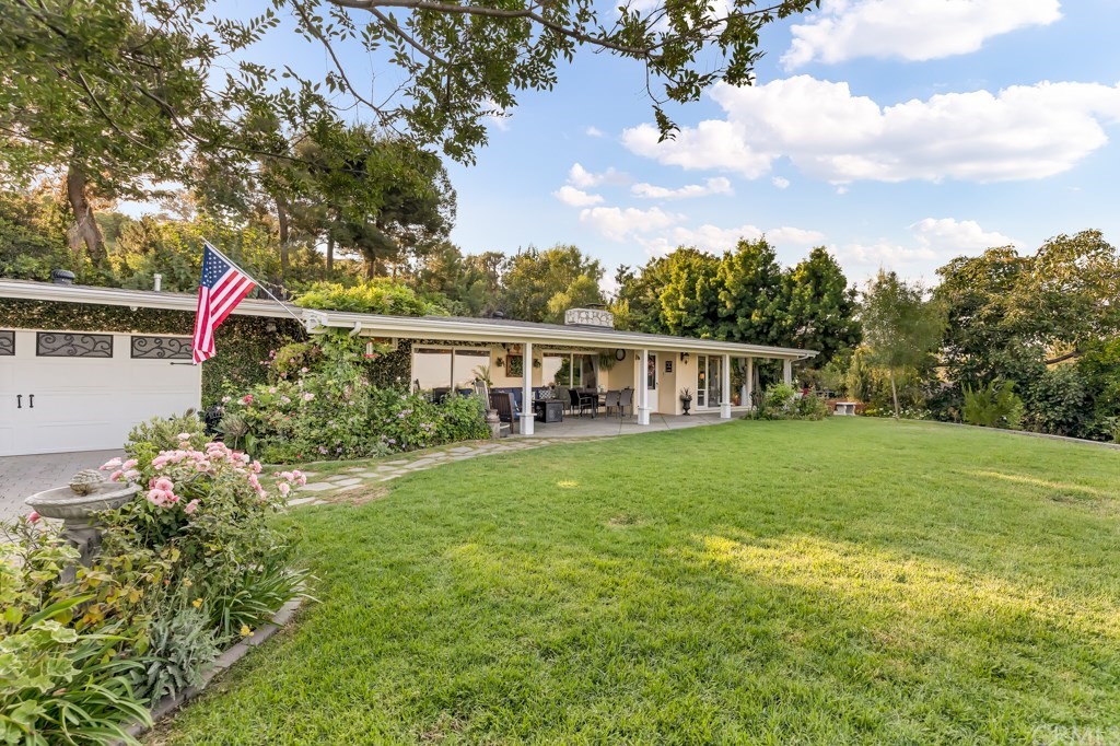 2601 Sunnyside Ridge Road Rancho Palos Verdes, CA 90275 - Photo 44 of 47 a view of a house with backyard and garden