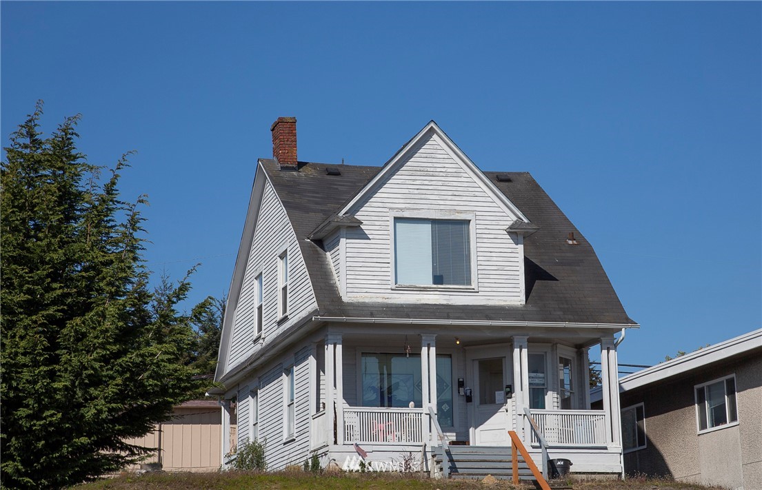 a front view of a house with a porch