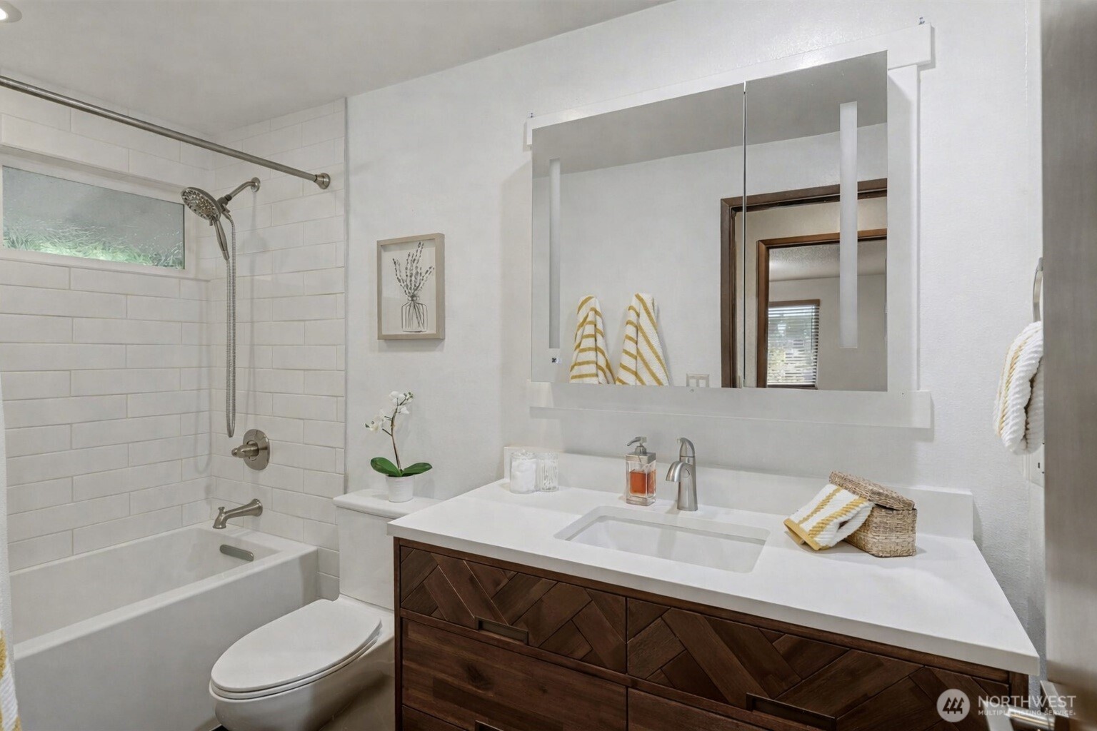 14604 Southeast 167th Place Renton, WA 98058 - Photo 14 of 23 a bathroom with a sink a toilet and shower