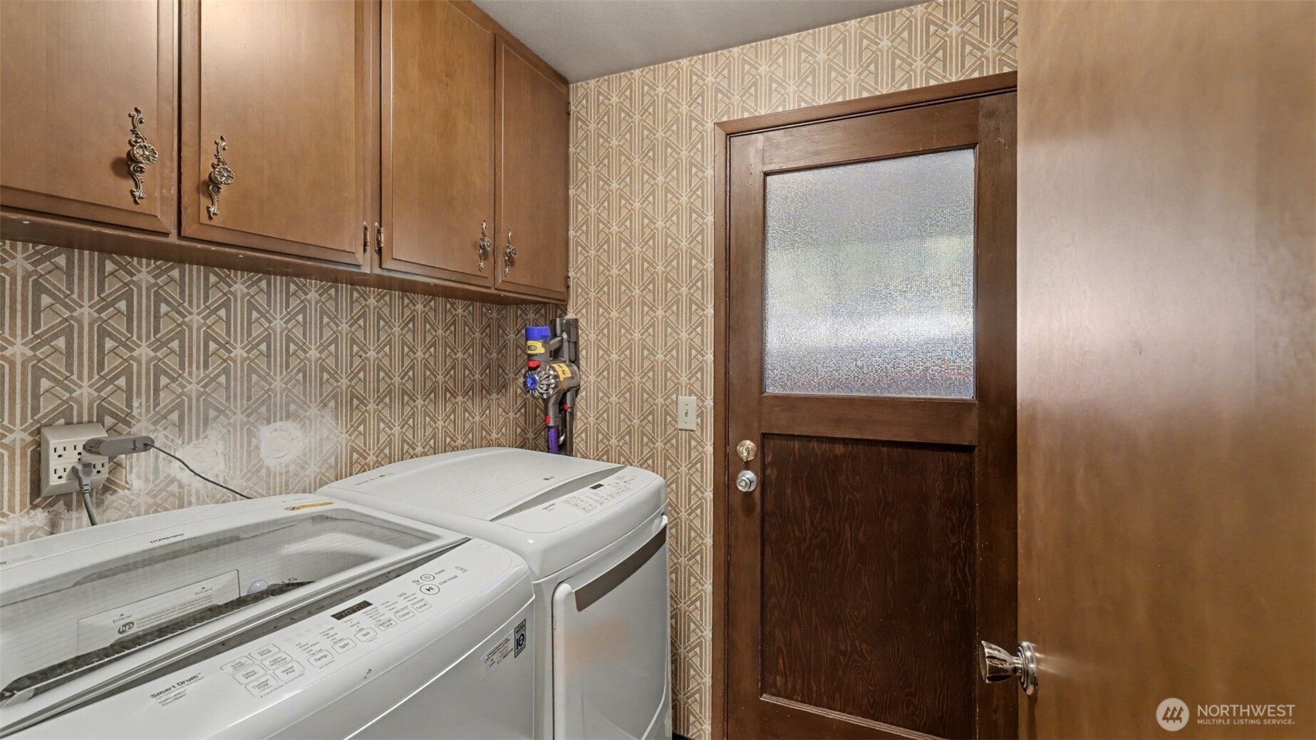 14604 Southeast 167th Place Renton, WA 98058 - Photo 15 of 23 a utility room with dryer and washer