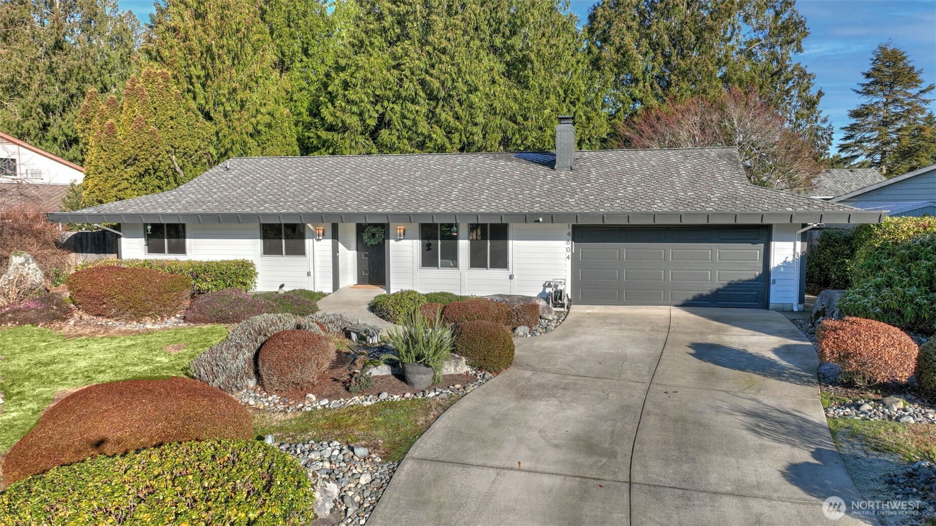 14604 Southeast 167th Place Renton, WA 98058 - Photo 23 of 23 a backyard of a house with table and chairs