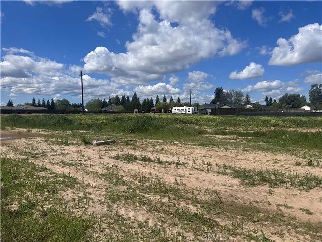 a view of a golf course with a lake