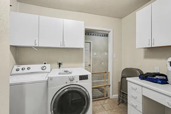 a view of kitchen and washer and dryer