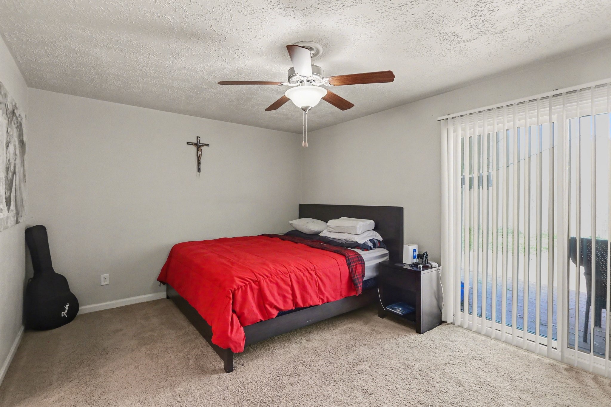 23219 Good Dale Lane Spring, TX 77373 - Photo 15 of 20 a bed room with a bed and a ceiling fan