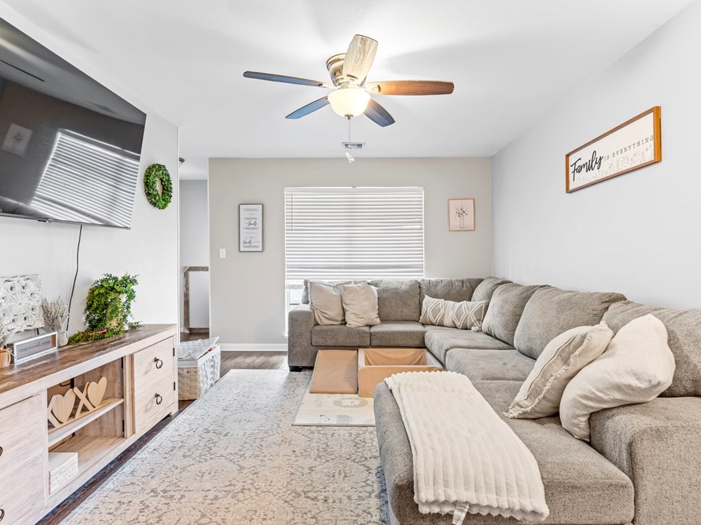 4009 Rice Avenue Bay City, TX 77414 - Photo 20 of 26 a living room with furniture and a flat screen tv