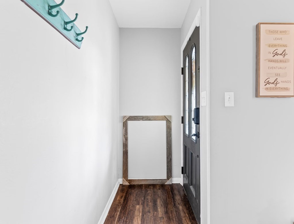 4009 Rice Avenue Bay City, TX 77414 - Photo 21 of 26 a view of front door with wooden floor