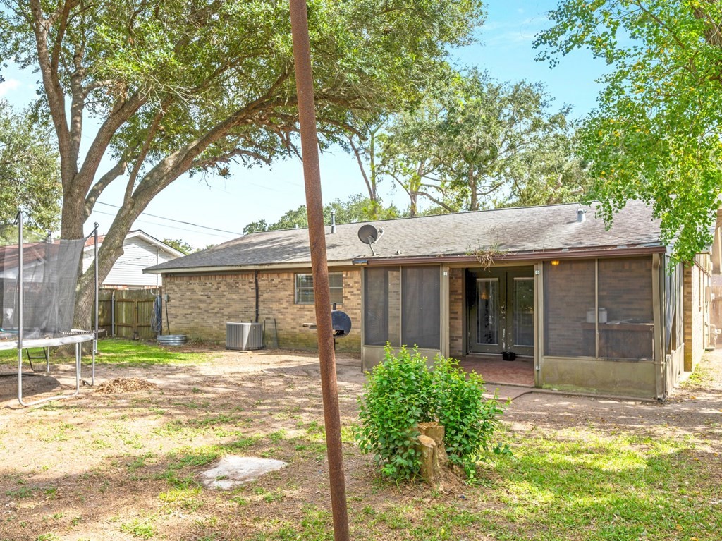 4009 Rice Avenue Bay City, TX 77414 - Photo 23 of 26 front view of a house with a yard