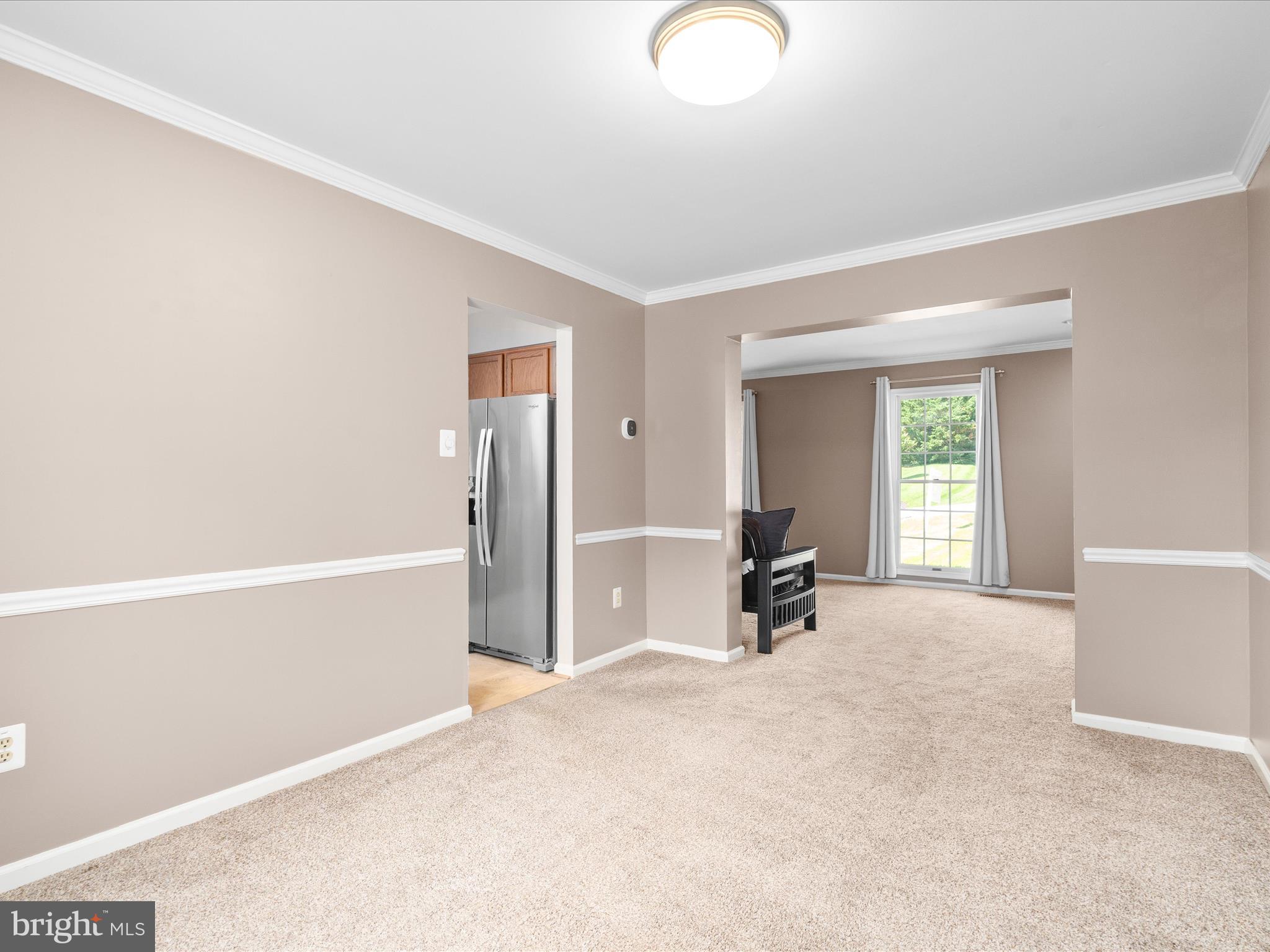 4609 Feldspar Road Middletown, MD 21769 - Photo 13 of 63 a living room with furniture and a window