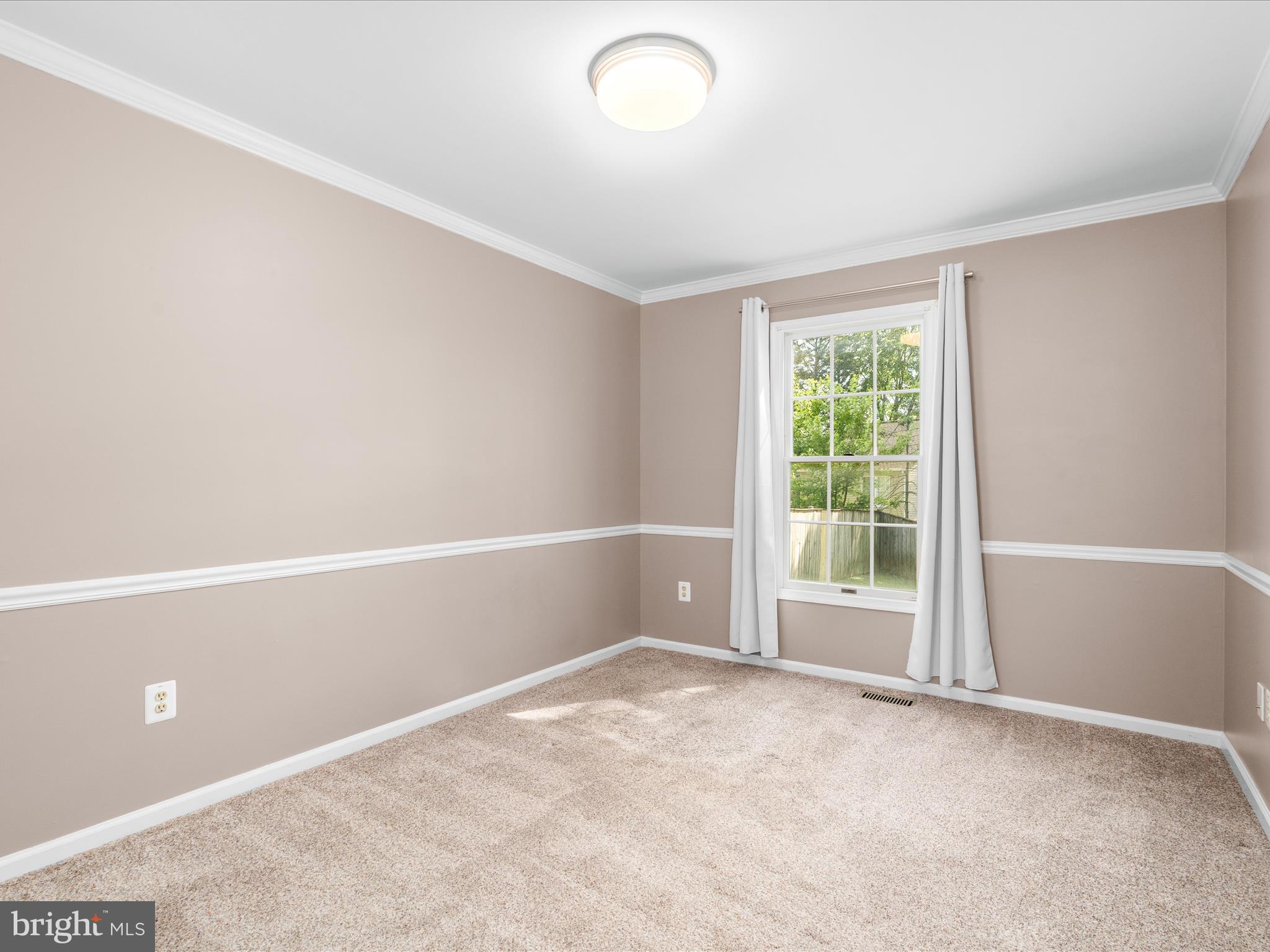 4609 Feldspar Road Middletown, MD 21769 - Photo 14 of 63 an empty room with windows