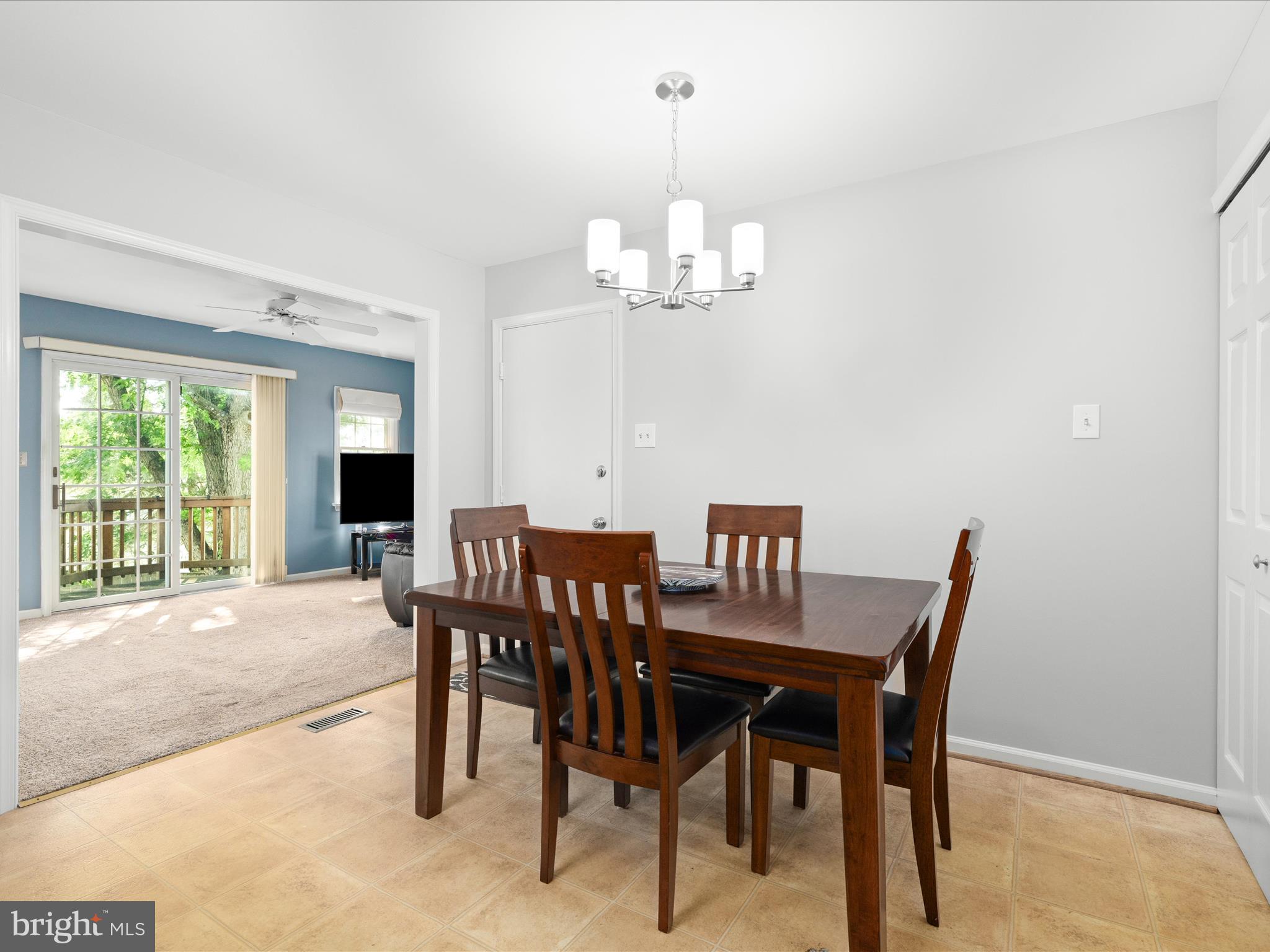 4609 Feldspar Road Middletown, MD 21769 - Photo 21 of 63 a view of a dining room with furniture window and outside view