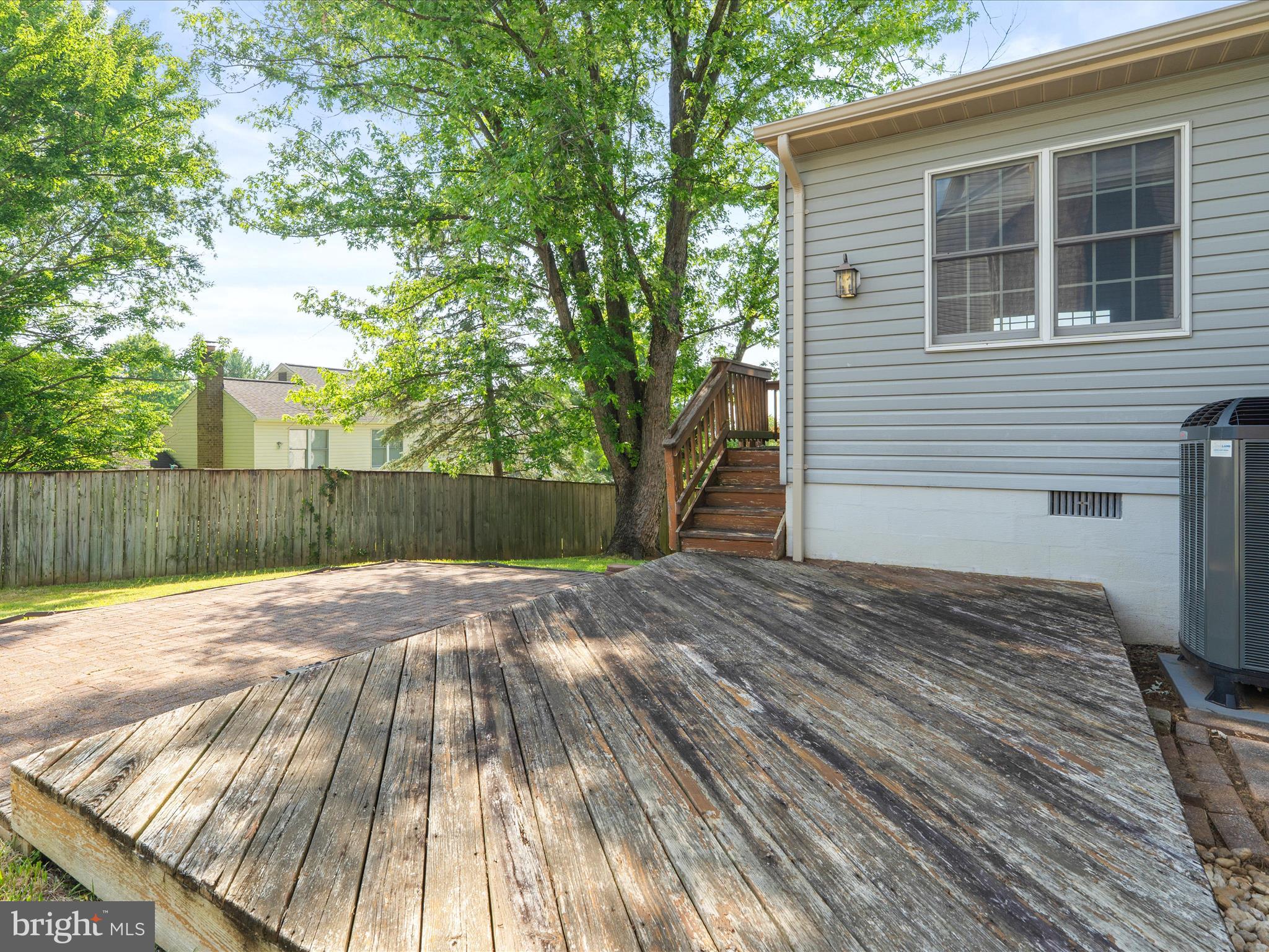 4609 Feldspar Road Middletown, MD 21769 - Photo 49 of 63 a view of backyard with wooden floor and fence
