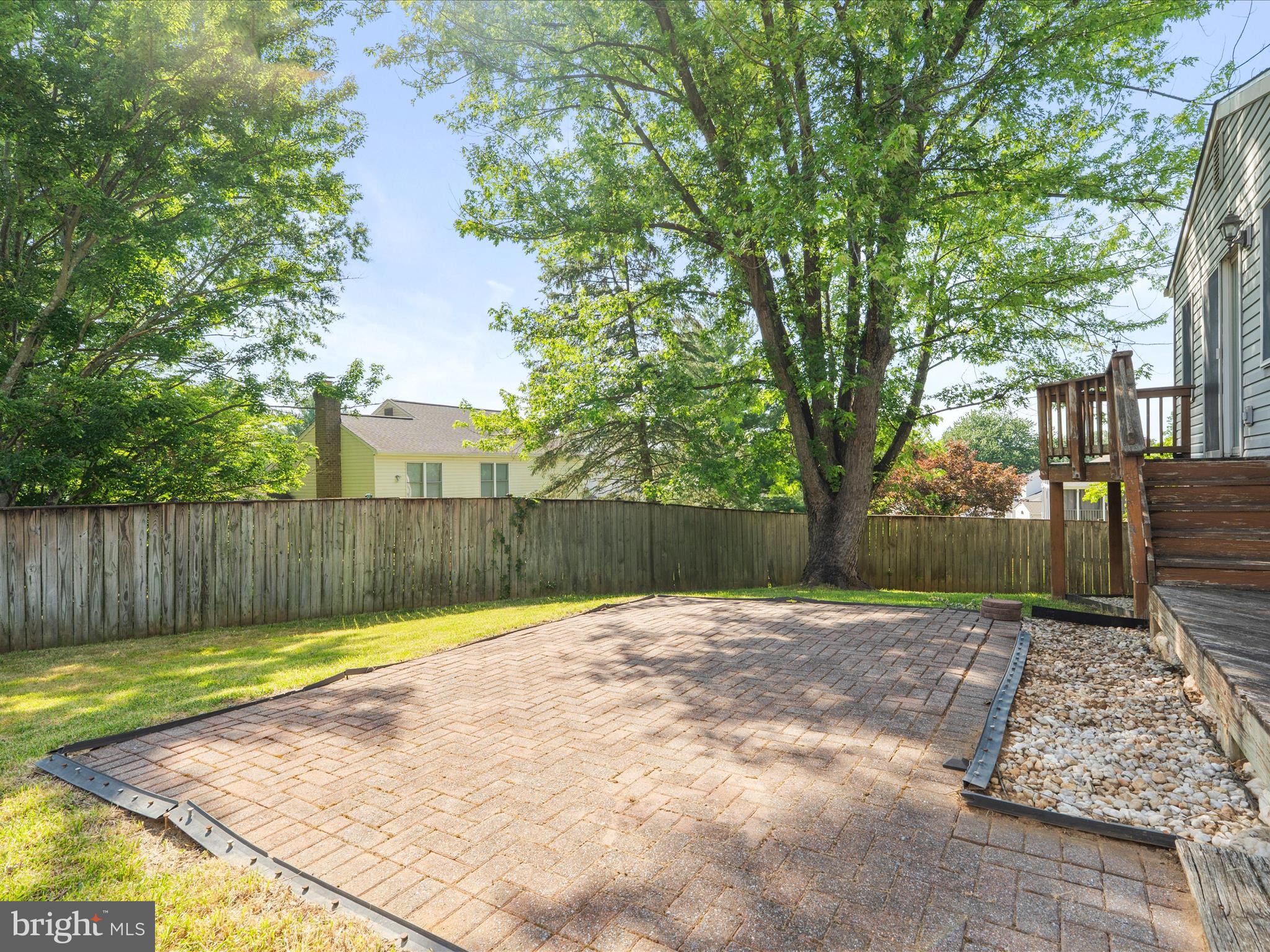 4609 Feldspar Road Middletown, MD 21769 - Photo 50 of 63 a view of a backyard with a large tree