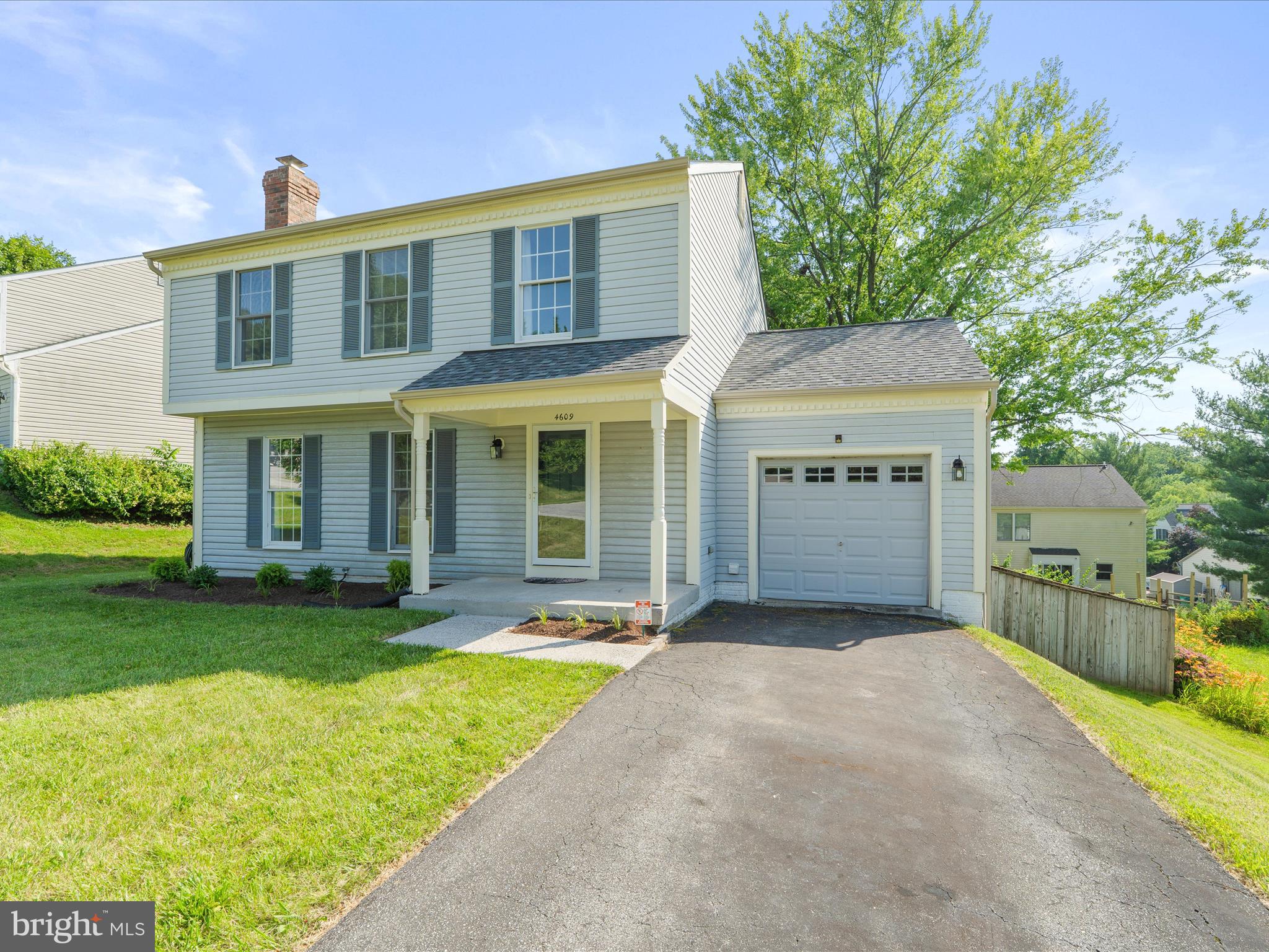 4609 Feldspar Road Middletown, MD 21769 - Photo 5 of 63 front view of a house with a yard