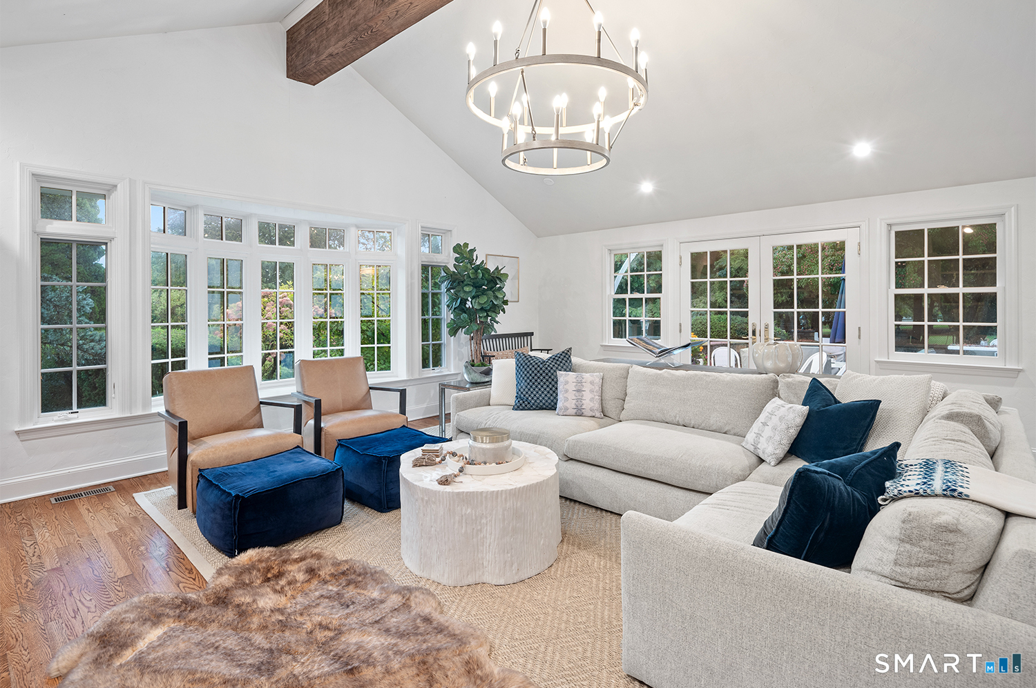 775 Sasco Hill Road Fairfield, CT 06824 - Photo 12 of 36 a living room with furniture windows and wooden floor