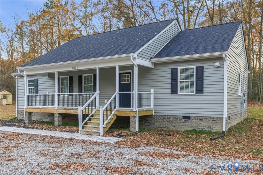 2700 River Road Prince George, VA 23875 - Photo 4 of 24 a front view of a house with garden