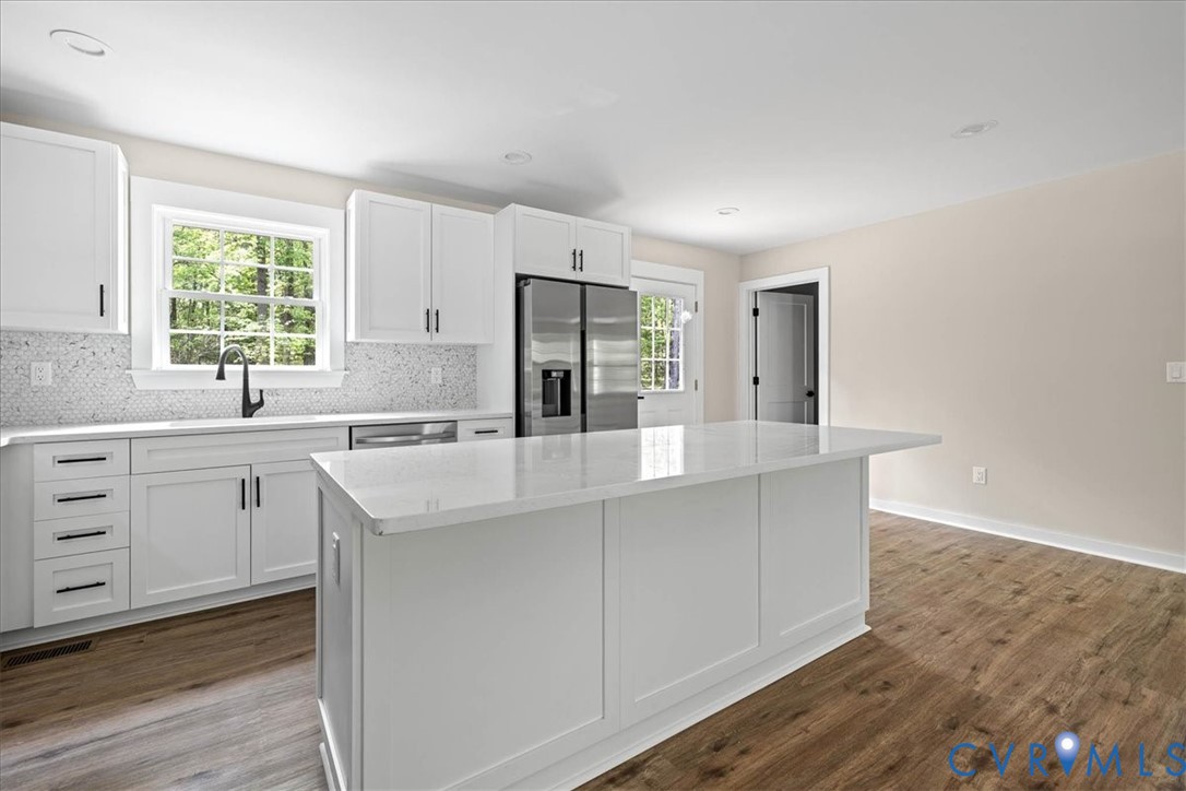2700 River Road Prince George, VA 23875 - Photo 9 of 24 a kitchen with sink cabinets and window