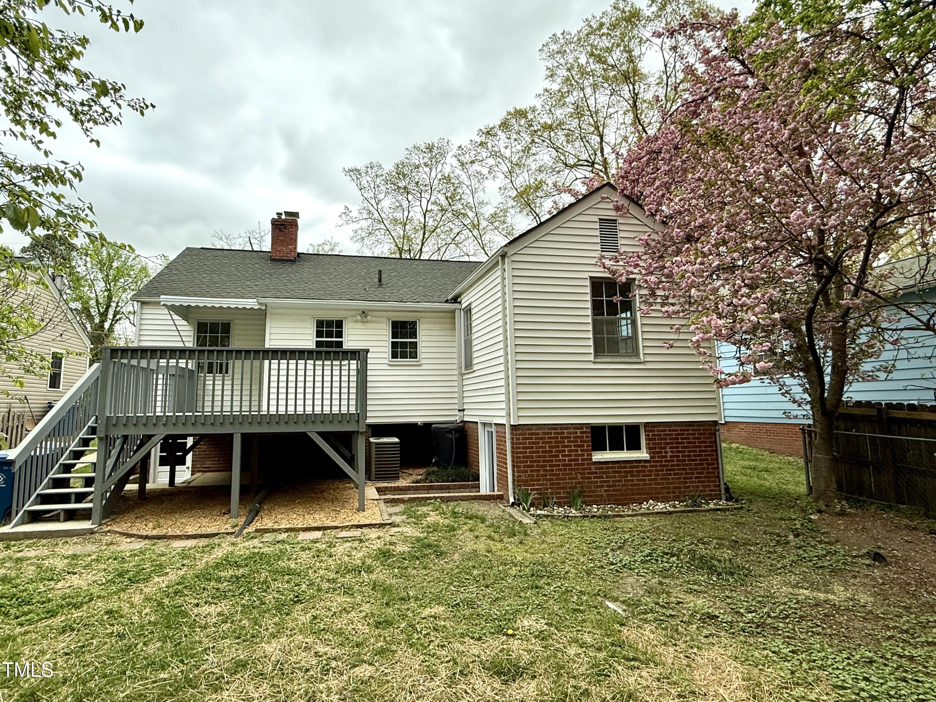 2409 Shenandoah Avenue Durham, NC 27704 - Photo 23 of 31 a view of a house with backyard and sitting area
