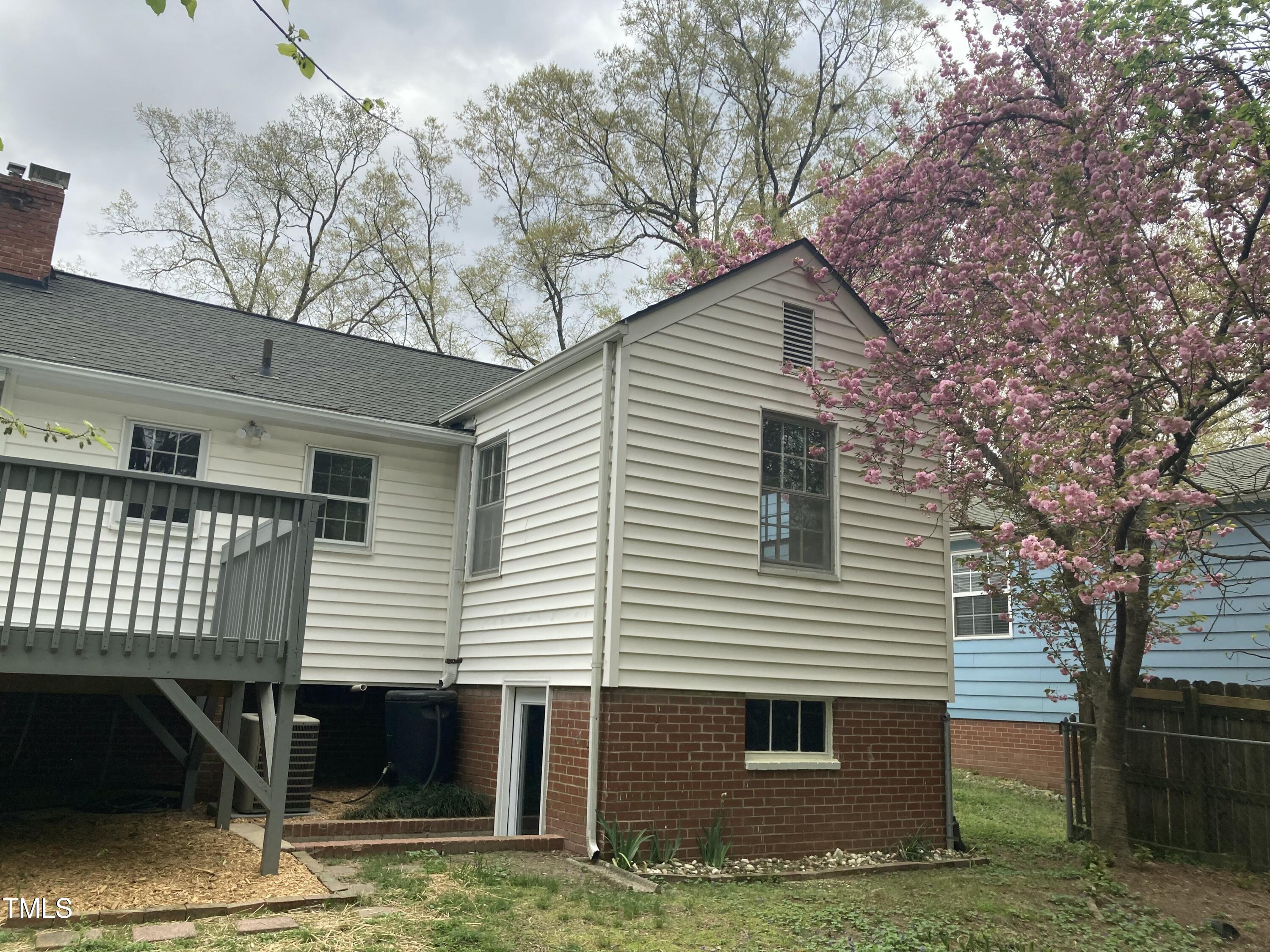 2409 Shenandoah Avenue Durham, NC 27704 - Photo 24 of 31 a front view of a house with garage