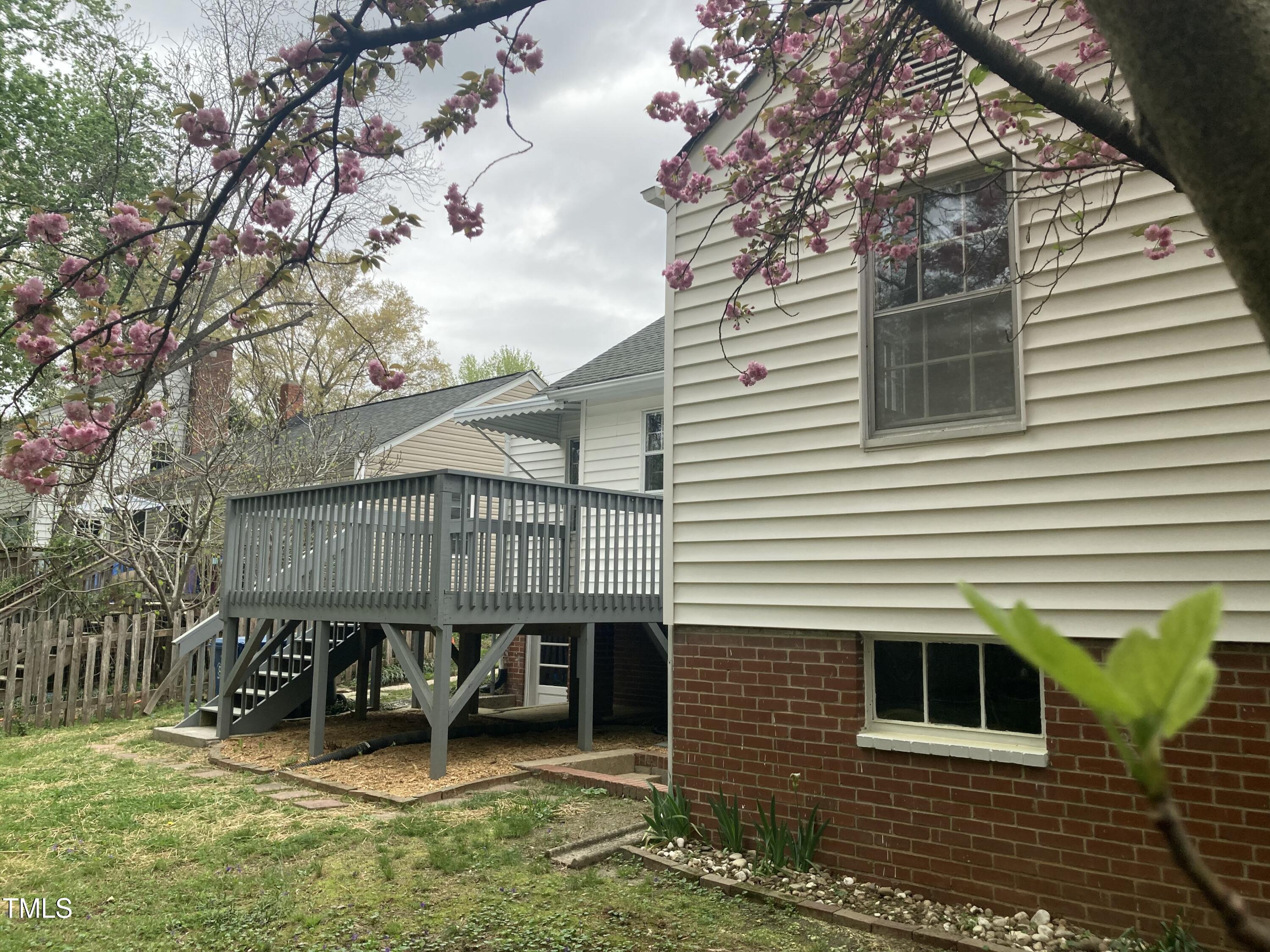 2409 Shenandoah Avenue Durham, NC 27704 - Photo 25 of 31 a view of a house with a yard