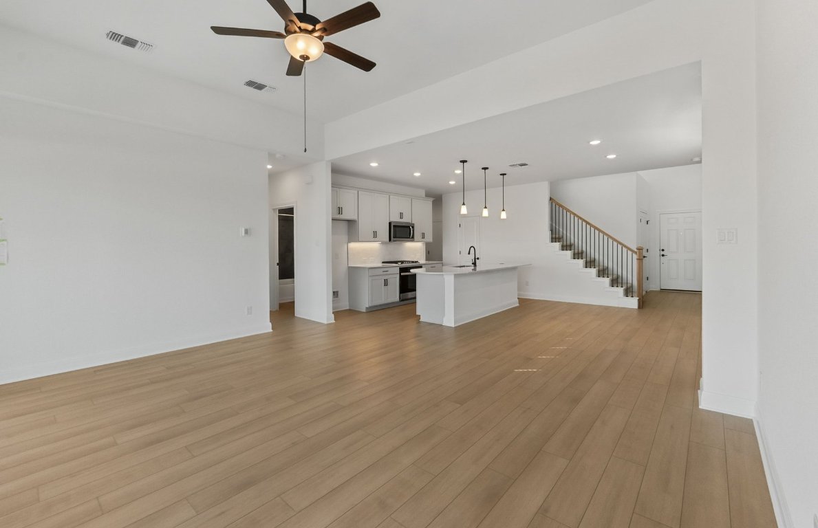 217 Regatta Trail Leander, TX 78641 - Photo 10 of 28 a view of an empty room and kitchen view