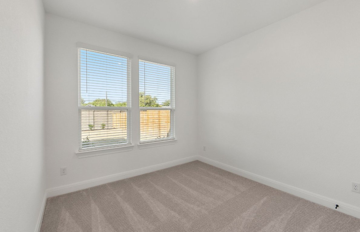 217 Regatta Trail Leander, TX 78641 - Photo 11 of 28 an empty room with a window