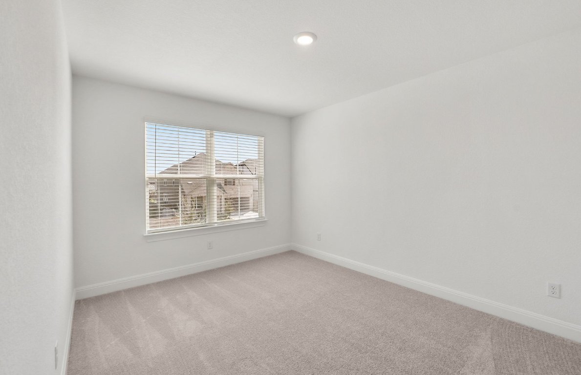 217 Regatta Trail Leander, TX 78641 - Photo 20 of 28 an empty room with a window