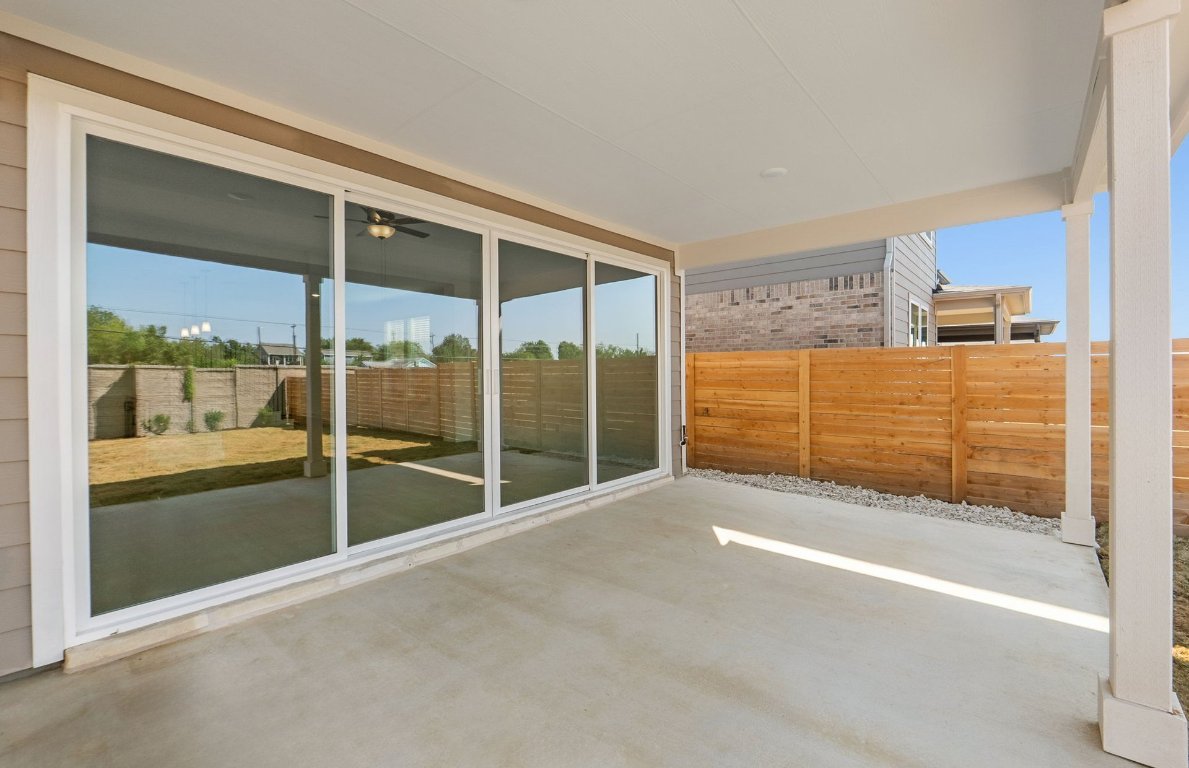 217 Regatta Trail Leander, TX 78641 - Photo 25 of 28 a view of an empty room with a fireplace