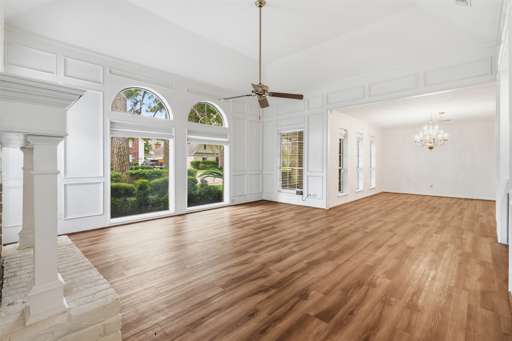 8310 Mentmore Drive Spring, TX 77379 - Photo 8 of 47 Spacious living room filled with natural light, creating a comfortable space for everyday living and entertaining.