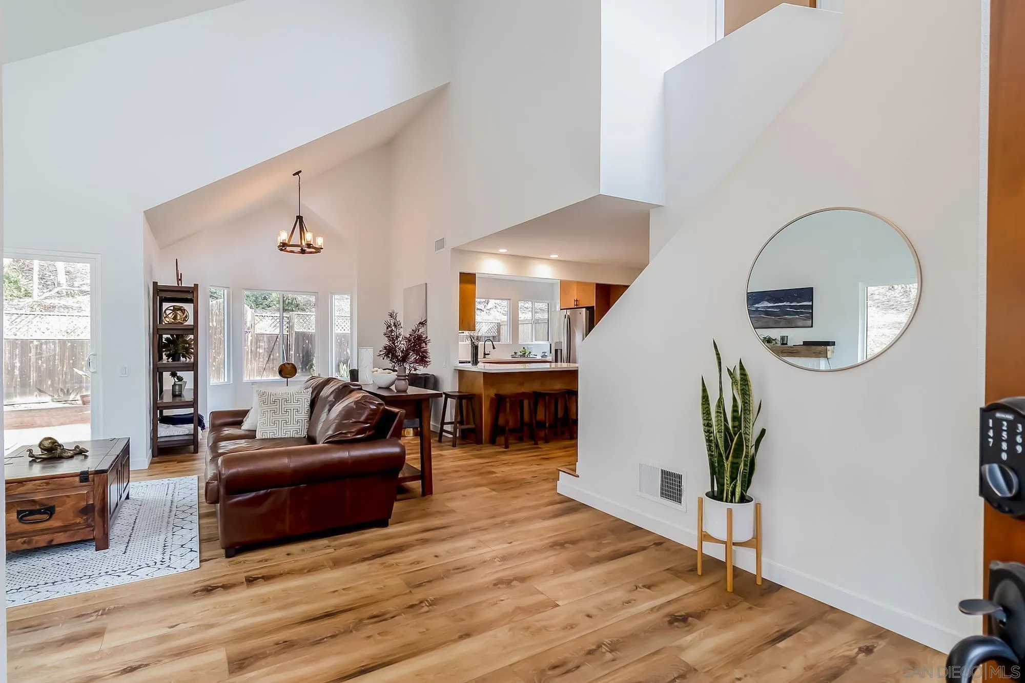 2710 Fernglen Road Carlsbad, CA 92008 - Photo 1 of 37 a living room with furniture and a wooden floor